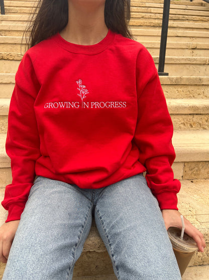 Growing in Progress Embroidered Red Crewneck