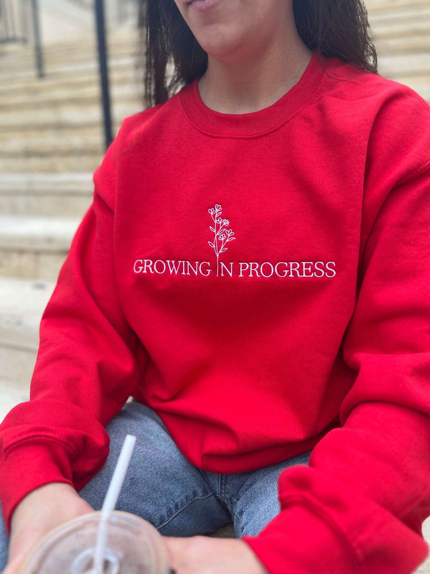 Growing in Progress Embroidered Red Crewneck