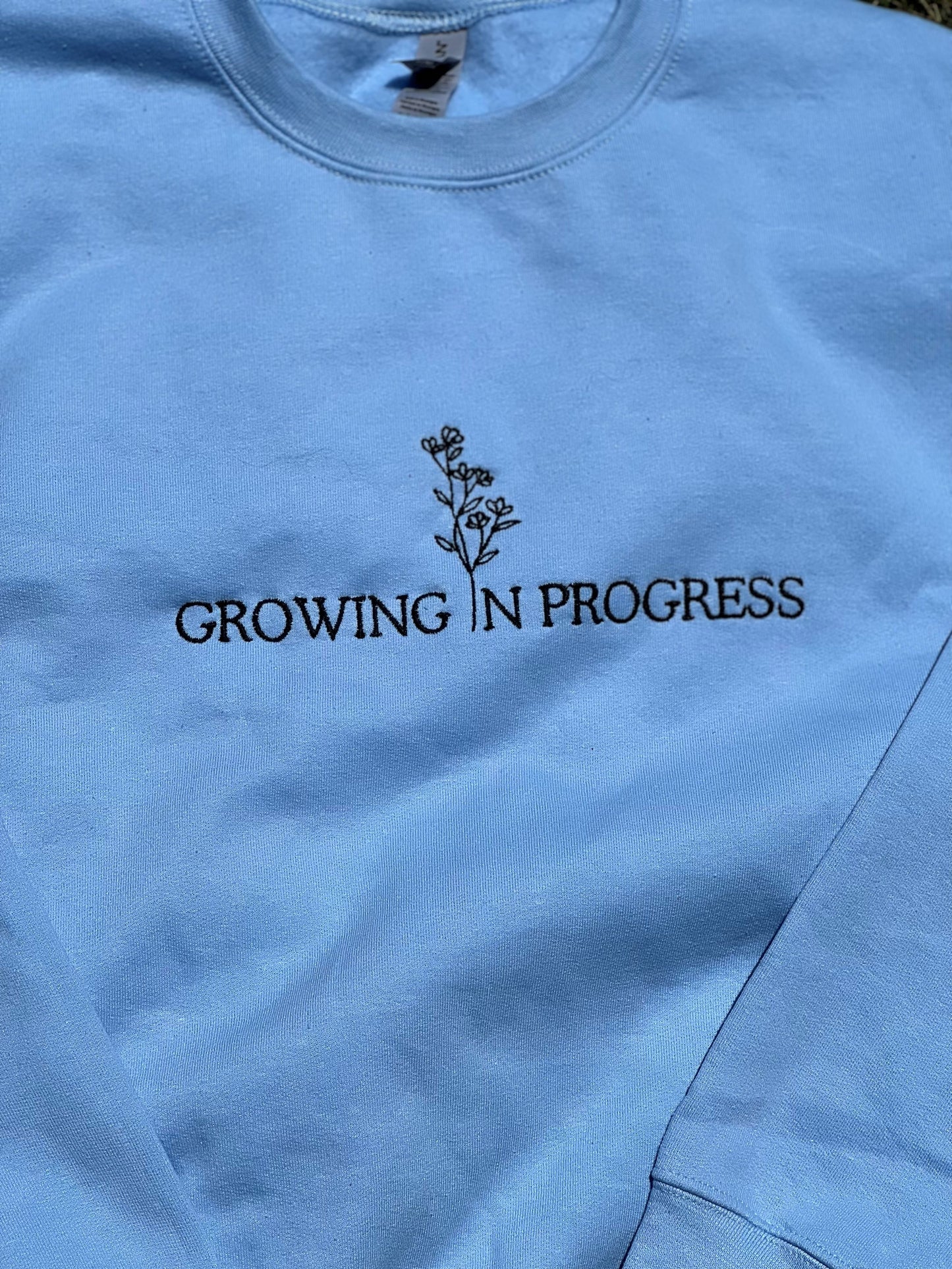 Growing in Progress Light Blue Embroidered Crewneck