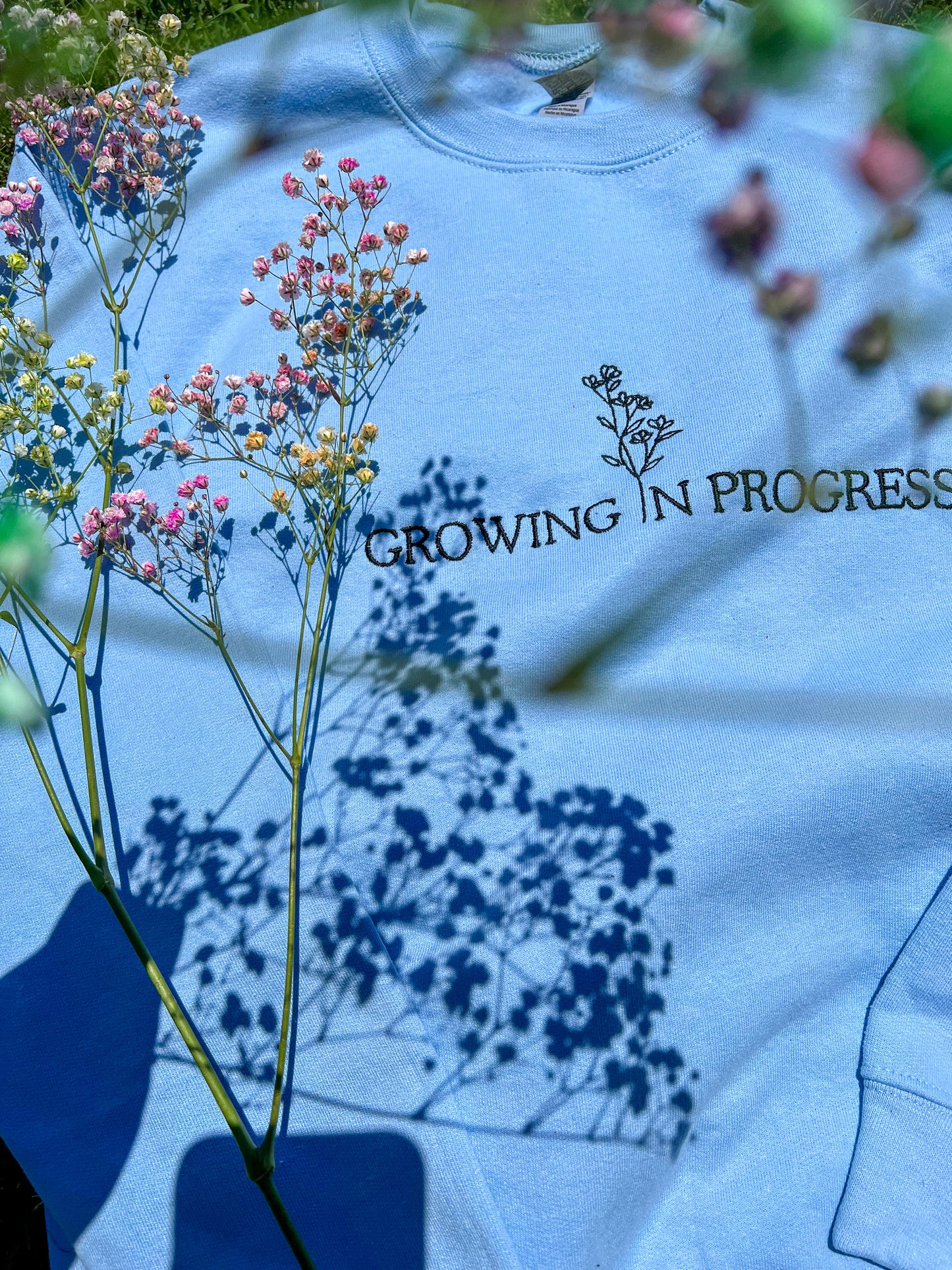 Growing in Progress Light Blue Embroidered Crewneck